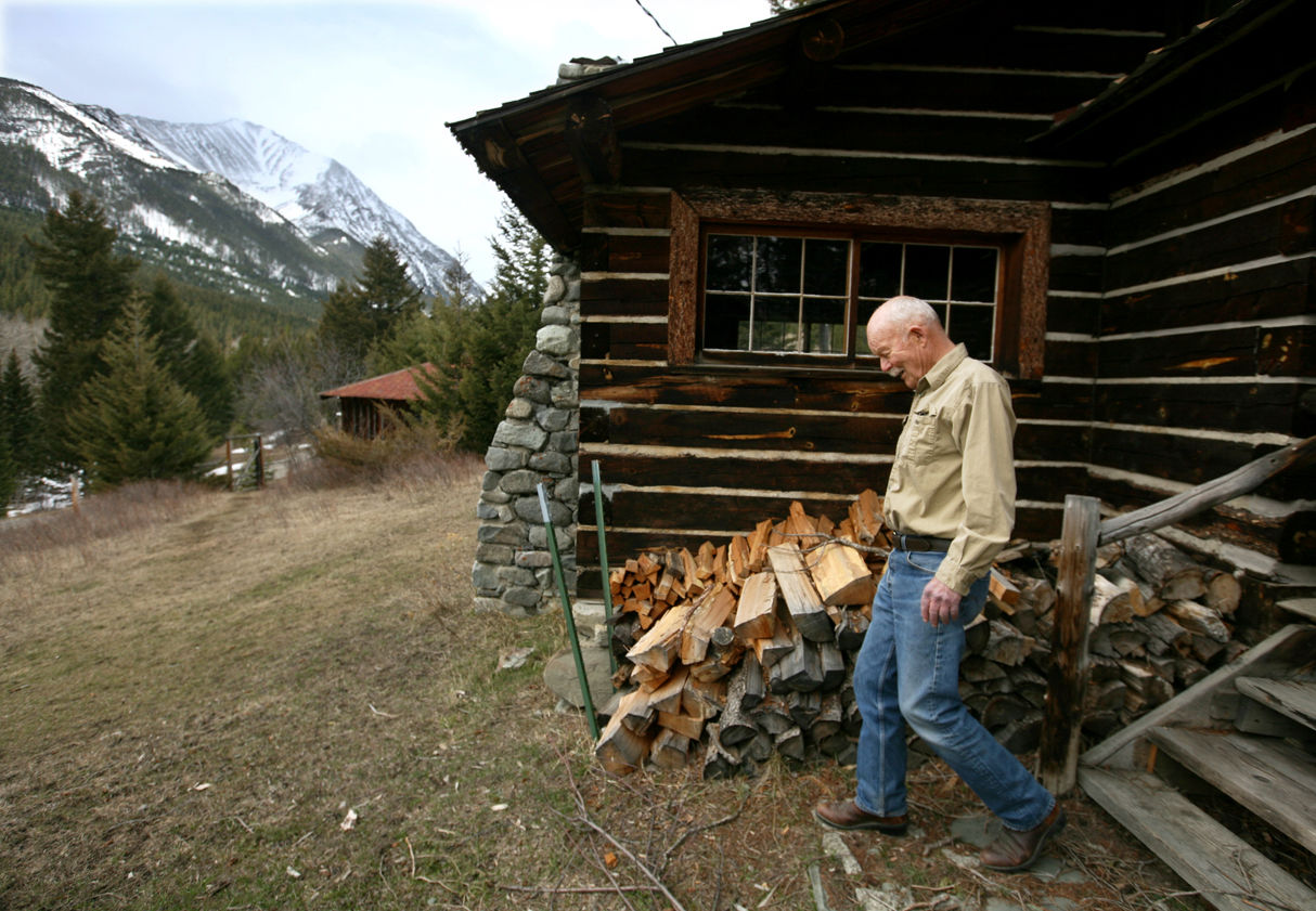 MUST CREDIT Tack Van Cleeve walks through the cabins
